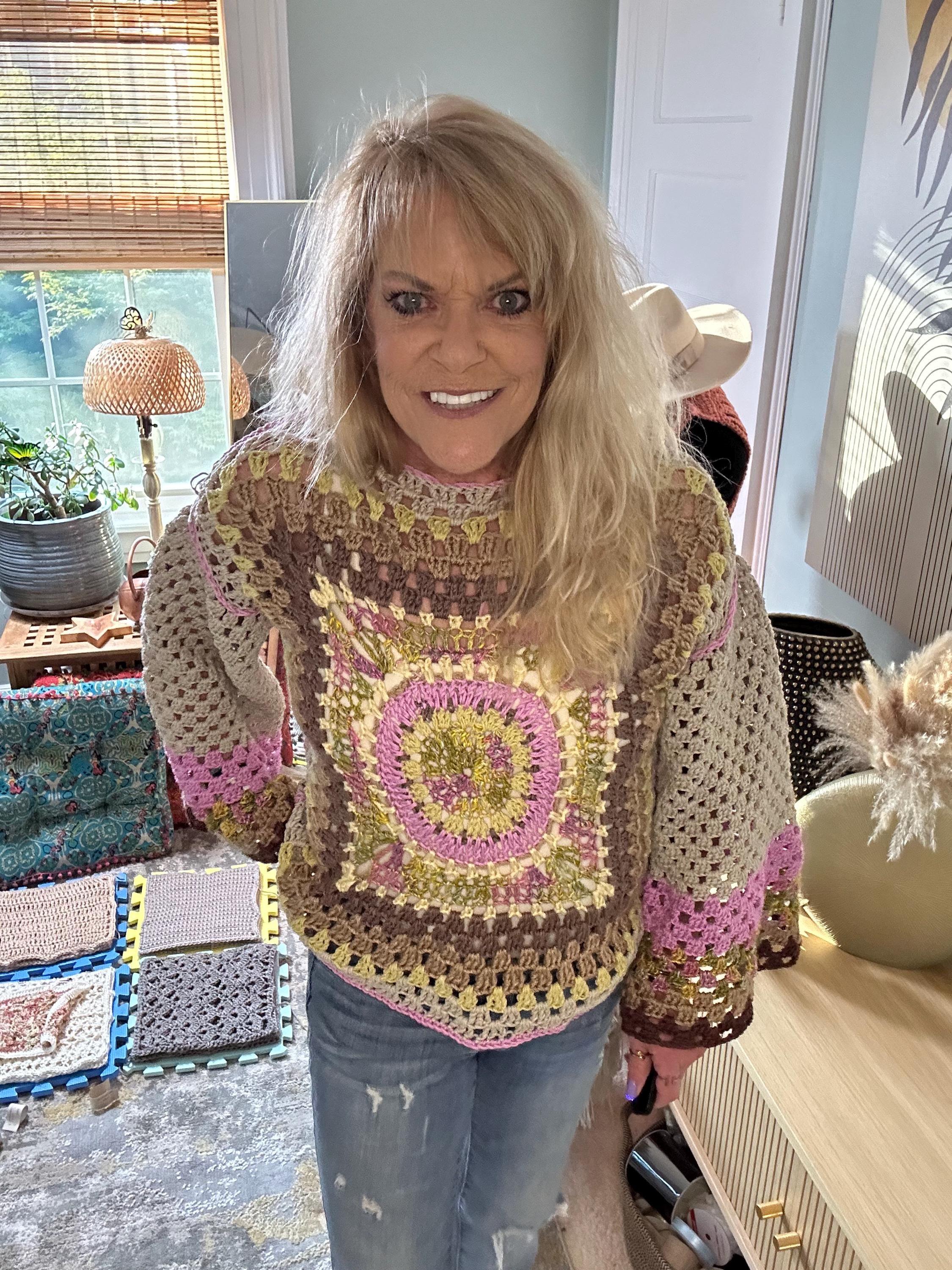 The Mediallion Hand Crocheted Sweater with vibrant color variations. Size S/M. Granny square on bavk