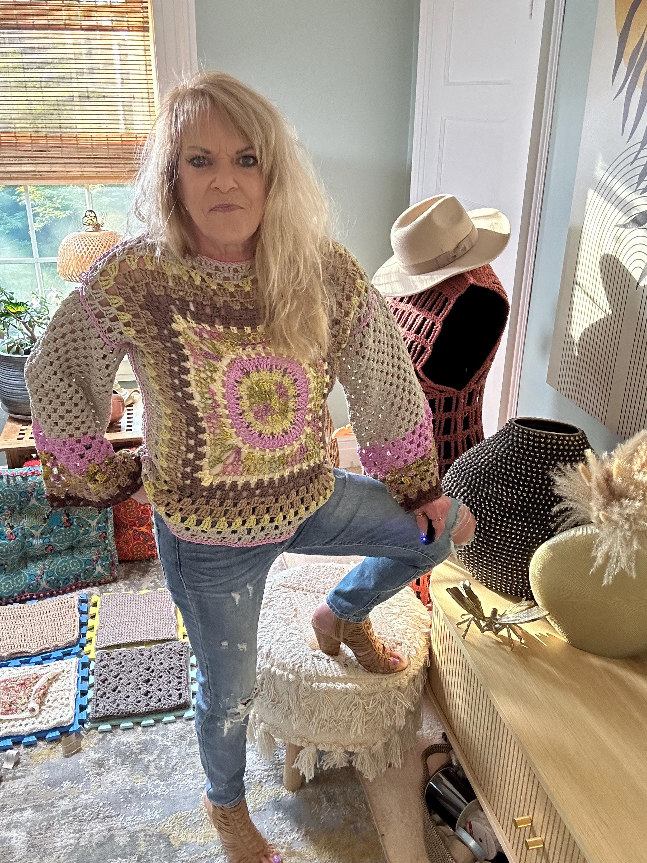 The Mediallion Hand Crocheted Sweater with vibrant color variations. Size S/M. Granny square on bavk