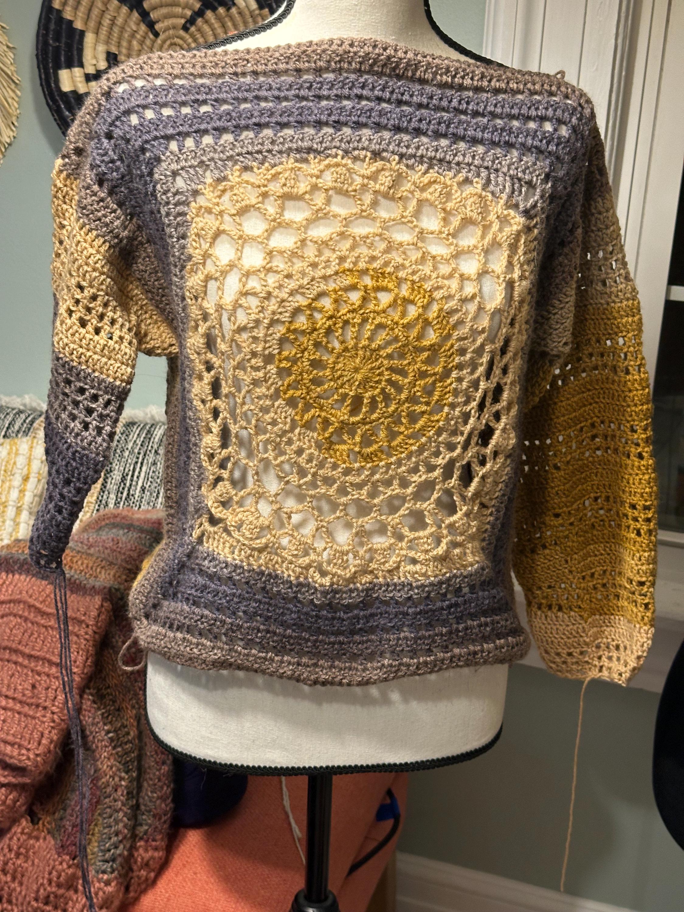 COSMIC MEDALLION SWEATER