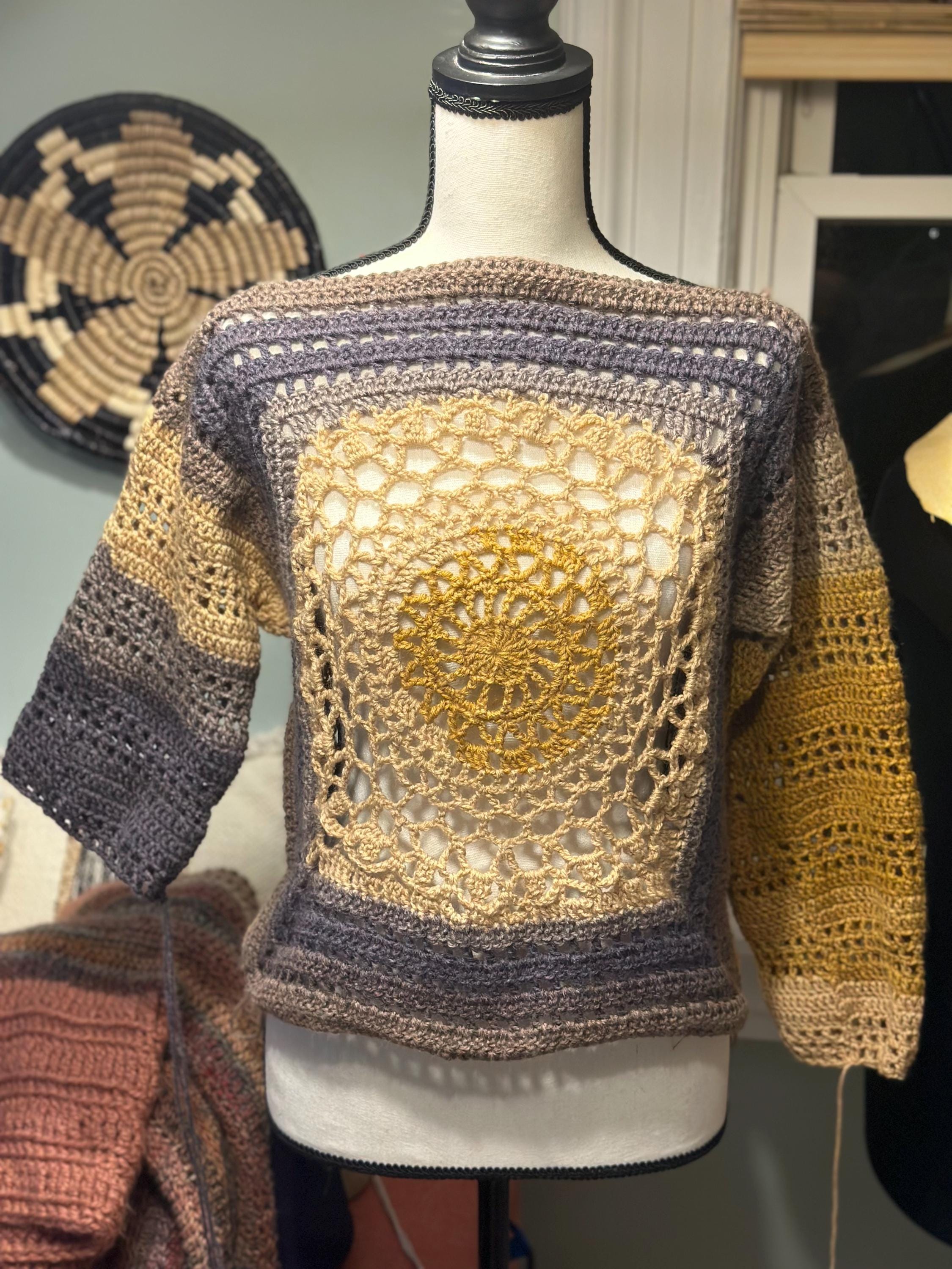 COSMIC MEDALLION SWEATER